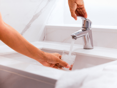 Filling up water cup at faucet.png