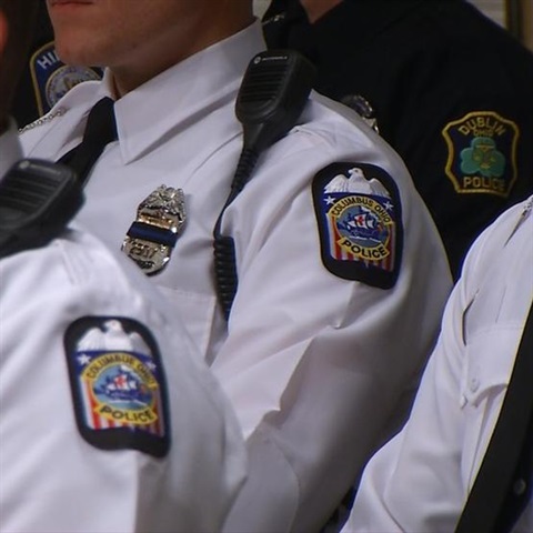 Several officers grouped together in dress uniform