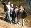 volunteers-near-water-with-trash-bags.jpg