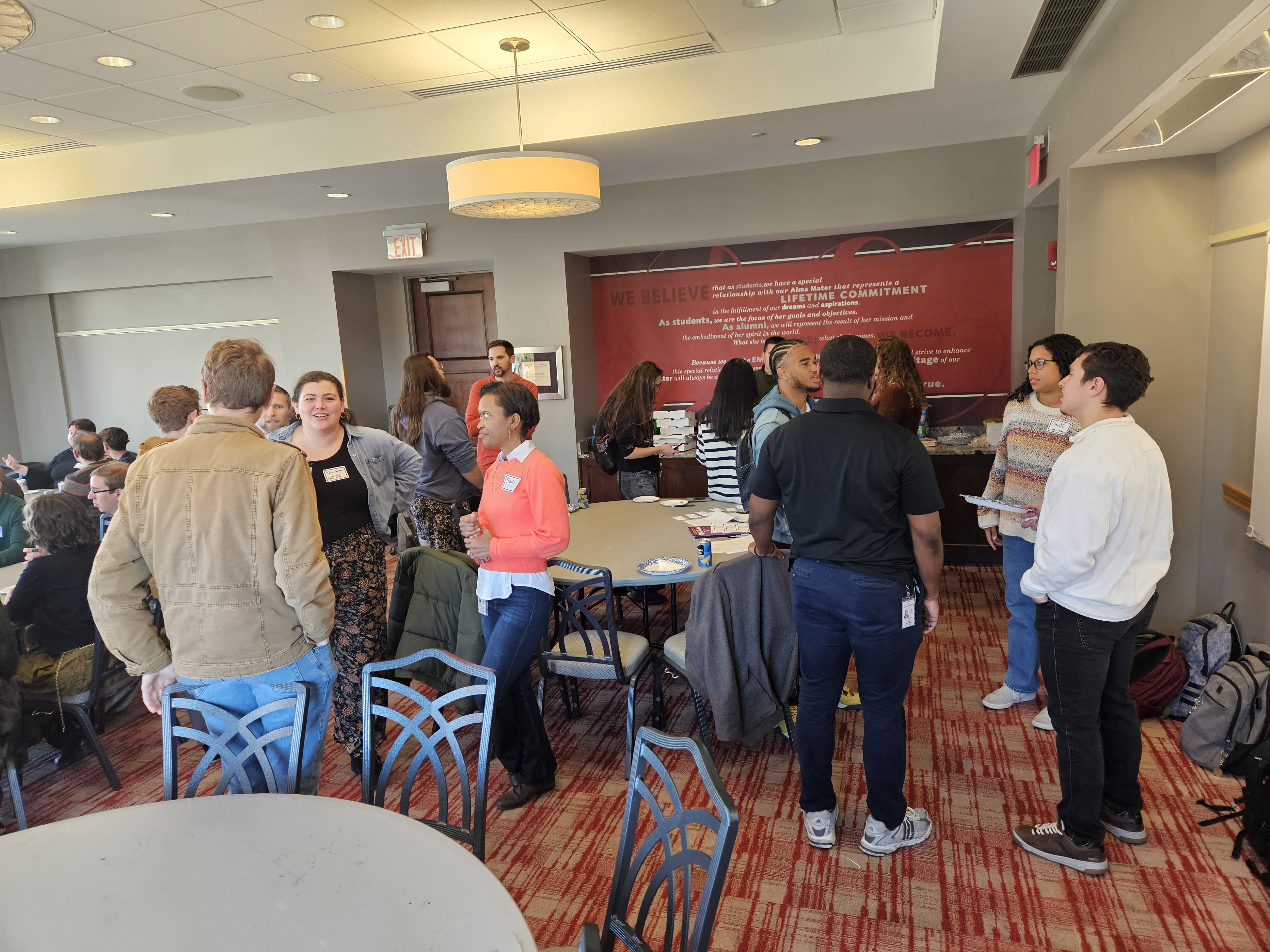 Students and Staff networking at a Picnic with Planners and Preservationists event